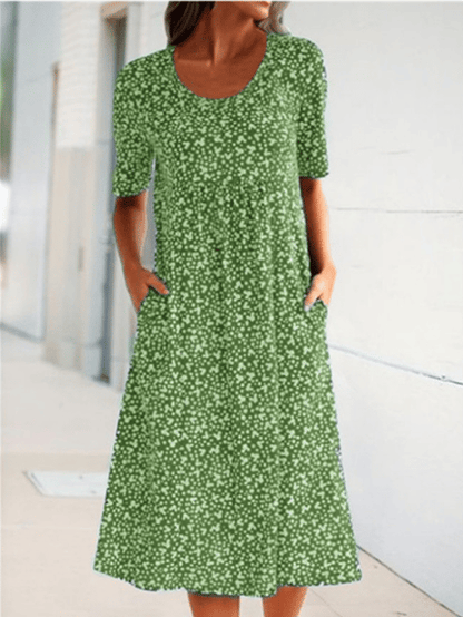 💝HEIßER VERKAUF💝Lässiges Baumwollkleid mit U-Ausschnitt und Blumenmuster für Damen (8 Farben mit Taschen)